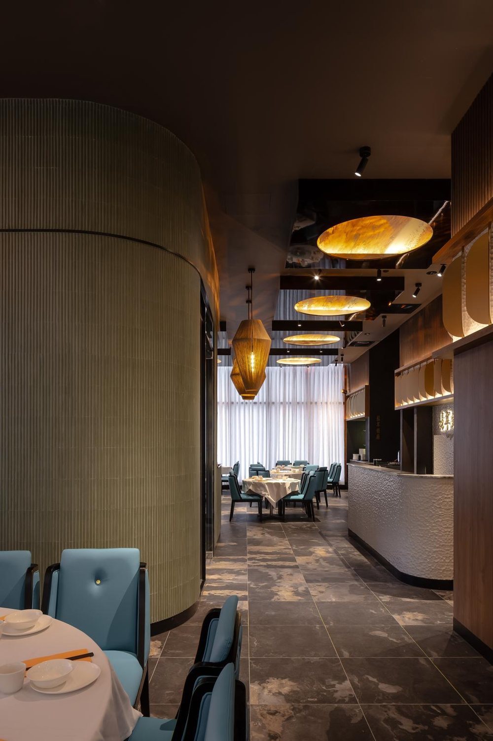 The jade fluted wall in the Crystal J dining room